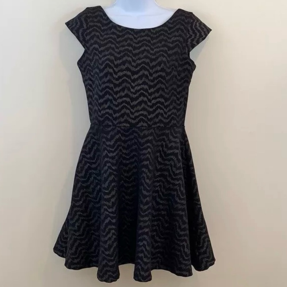 Stylish black with gray zigzags plunging back mini dress by Snap